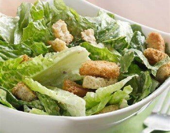 romaine lettuce in a towl with croutons